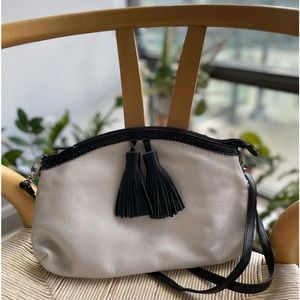 Black and white Danier leather purse